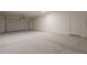 Spacious two car garage with epoxy floors and an automatic garage door offering ample parking and storage at 3483 W Sunstone Dr, San Tan Valley, AZ 85144