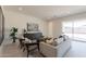 Bright living room featuring comfortable seating, stylish furniture, and natural light at 3483 W Sunstone Dr, San Tan Valley, AZ 85144