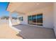 Covered patio with sliding glass door leading to the backyard creating a seamless indoor outdoor space at 3483 W Sunstone Dr, San Tan Valley, AZ 85144