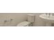 Neat powder room with a toilet, sink, and brushed nickel fixtures at 3483 W Sunstone Dr, San Tan Valley, AZ 85144