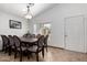 Bright dining room with a table for ten and plenty of natural light at 3514 W Sands Dr, Glendale, AZ 85310