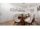 Dining room with a large table and decorated with pictures at 3514 W Sands Dr, Glendale, AZ 85310
