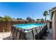 An inviting above ground pool set in the backyard, perfect for summer relaxation and recreation at 3514 W Sands Dr, Glendale, AZ 85310