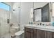 Sleek bathroom with a glass-enclosed shower, modern vanity, and stylish lighting fixtures at 36004 N Prickley Pear Rd, Cave Creek, AZ 85331