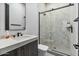 Modern bathroom featuring a glass-enclosed shower with marble tiling, sleek fixtures, and a stylish vanity for a luxurious feel at 36004 N Prickley Pear Rd, Cave Creek, AZ 85331