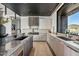 Modern kitchen with premium countertops, ample cabinetry, and stainless steel appliances at 36004 N Prickley Pear Rd, Cave Creek, AZ 85331