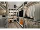 Spacious walk-in closet with built-in shelving and drawers, offering ample storage space at 36004 N Prickley Pear Rd, Cave Creek, AZ 85331