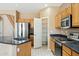 Bright kitchen with stainless steel appliances and plenty of cabinet space at 44390 W Buckhorn Trl, Maricopa, AZ 85138