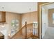 Staircase landing featuring high ceilings and natural light at 44390 W Buckhorn Trl, Maricopa, AZ 85138