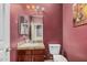 Charming half bathroom features a unique vanity and stylish fixtures at 4725 N 152Nd Dr, Goodyear, AZ 85395