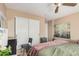 Inviting bedroom with closet space, carpet flooring, and neutral color scheme at 4725 N 152Nd Dr, Goodyear, AZ 85395
