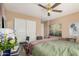 Inviting bedroom features carpet flooring, natural lighting, and closet space at 4725 N 152Nd Dr, Goodyear, AZ 85395