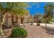 Charming home featuring a welcoming front porch with landscaped yard at 4725 N 152Nd Dr, Goodyear, AZ 85395