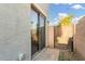 A view of the home's exterior showing access to the backyard space at 4786 E Laurel Ct, Gilbert, AZ 85234