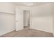 Bedroom with shelving, carpet, and an open doorway to the adjacent room at 4786 E Laurel Ct, Gilbert, AZ 85234