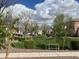Beautiful neighborhood park with green space, mature trees, and walking path at 4786 E Laurel Ct, Gilbert, AZ 85234