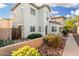 Beautiful exterior view of a two-story home with a well-maintained yard and desert landscaping at 4786 E Laurel Ct, Gilbert, AZ 85234