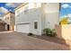 Spacious two-car garage with ample driveway and desert landscaping at 4786 E Laurel Ct, Gilbert, AZ 85234