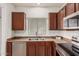 Kitchen boasts stainless steel appliances and tile floors at 4786 E Laurel Ct, Gilbert, AZ 85234