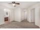 Spacious main bedroom with carpet flooring and ensuite bathroom access at 4786 E Laurel Ct, Gilbert, AZ 85234