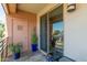 Relaxing balcony featuring sliding glass doors, potted plants, and seating with views at 4803 N Woodmere Fairway -- # 2012, Scottsdale, AZ 85251