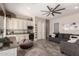Open-concept living room with a snack bar area with lots of storage and comfortable seating space at 5114 S Leisure Ct, Gilbert, AZ 85298