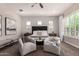 Well-lit main bedroom with neutral tones, plantation shutters and comfortable seating arrangement at 5114 S Leisure Ct, Gilbert, AZ 85298