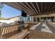 Built-in outdoor kitchen with stainless steel grill and sink under a pergola, ideal for entertaining at 5114 S Leisure Ct, Gilbert, AZ 85298