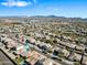 Aerial view of the neighborhood, surrounded by desert landscape with a mix of single-Gathering homes and community amenities at 5318 W Grenadine Rd, Laveen, AZ 85339