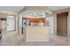 Well-lit kitchen featuring sleek countertops, modern appliances, and an open layout at 5318 W Grenadine Rd, Laveen, AZ 85339