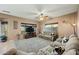 Cozy living room featuring comfortable sofas, plush carpeting, and ample natural light at 5318 W Grenadine Rd, Laveen, AZ 85339