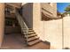Exterior staircase leading to a second-story unit with a shade canopy at 533 W Guadalupe Rd # 1001, Mesa, AZ 85210