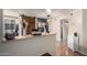 Open concept kitchen with breakfast bar, decorative vases, stainless steel refrigerator and hanging lights at 533 W Guadalupe Rd # 1001, Mesa, AZ 85210