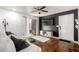 Inviting living space with wood-look floors, stylish decor, and a sliding glass door at 533 W Guadalupe Rd # 1001, Mesa, AZ 85210