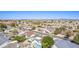 Neighborhood aerial shot with mountain views, showcasing a home with a pool at 5333 E Catalina Ave, Mesa, AZ 85206