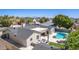 Aerial view of a house highlighting the backyard pool, patio and outdoor living spaces at 5333 E Catalina Ave, Mesa, AZ 85206