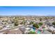High aerial neighborhood view with mountain backdrop, highlighting community charm and serenity at 5333 E Catalina Ave, Mesa, AZ 85206
