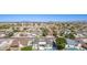 Wide aerial perspective of a residential neighborhood, featuring homes with private pools at 5333 E Catalina Ave, Mesa, AZ 85206