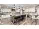 A beautiful kitchen with granite counters, a large island, and stainless steel appliances at 5333 E Catalina Ave, Mesa, AZ 85206