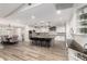 Spacious kitchen with a large island, stainless steel appliances, and sleek countertops at 5333 E Catalina Ave, Mesa, AZ 85206