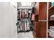 Walk-in closet featuring custom shelves and drawers for ample storage and organization at 5333 E Catalina Ave, Mesa, AZ 85206