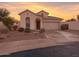 Charming single-story home featuring a landscaped front yard and an attached two-car garage at 6279 S Martingale Ct, Gilbert, AZ 85298
