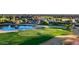 Golf course and small pond near a clubhouse at 6279 S Martingale Ct, Gilbert, AZ 85298
