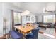 Comfortable dining and living area with stylish furnishings and natural light pouring in from the window at 6279 S Martingale Ct, Gilbert, AZ 85298