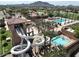 Water park with a slide and multiple pools at 6279 S Martingale Ct, Gilbert, AZ 85298