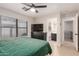 Relaxing bedroom with view to ensuite bathroom and a large window at 640 E Browning Way, Chandler, AZ 85286