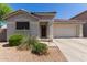 Charming single-story home with a tile roof, desert landscaping, and an attached two-car garage at 640 E Browning Way, Chandler, AZ 85286