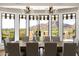 Formal dining room with a large wooden table and great views of the landscape at 7046 N 59Th Pl, Paradise Valley, AZ 85253