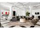 Stylish living room featuring sleek furniture, modern design, and a spacious layout at 7046 N 59Th Pl, Paradise Valley, AZ 85253