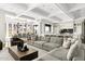 Inviting living area combines comfort and style, leading to a modern kitchen and dining space with mountain views at 7046 N 59Th Pl, Paradise Valley, AZ 85253